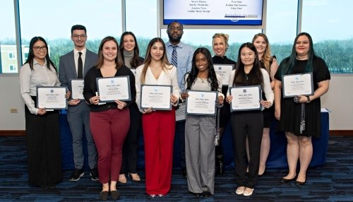 First-generation IL students induction into honor society.