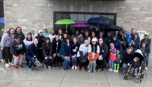 Participants from the Speech-Language Pathology Program gather for a group photo at the Chicago Walk for Apraxia.