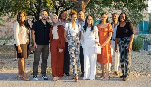 Group taking a photo at the Alumni Diversity Council Dinner.